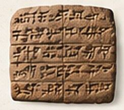 Clay tablet with cuneiform impressions